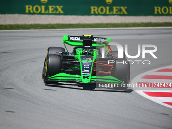 Guanyu Zhou of Stake F1 Team KICK Sauber is driving his single-seater during free practice of the Spanish GP, the 10th round of the Formula...