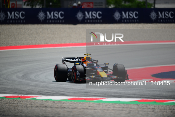 Sergio Perez of Red Bull Racing Honda is driving his single-seater during free practice of the Spanish GP, the 10th round of the Formula 1 W...