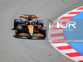 Oscar Piastri of McLaren F1 Team is driving his single-seater during free practice of the Spanish GP, the 10th round of the Formula 1 World...