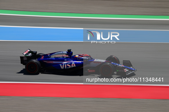 Daniel Ricciardo of Visa Cash-Up Racing Bulls is driving his single-seater during free practice of the Spanish GP, the 10th round of the For...