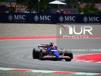 Daniel Ricciardo of Visa Cash-Up Racing Bulls is driving his single-seater during free practice of the Spanish GP, the 10th round of the For...