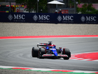 Daniel Ricciardo of Visa Cash-Up Racing Bulls is driving his single-seater during free practice of the Spanish GP, the 10th round of the For...