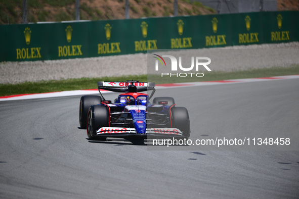 Daniel Ricciardo of Visa Cash-Up Racing Bulls is driving his single-seater during free practice of the Spanish GP, the 10th round of the For...