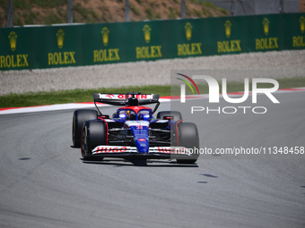 Daniel Ricciardo of Visa Cash-Up Racing Bulls is driving his single-seater during free practice of the Spanish GP, the 10th round of the For...