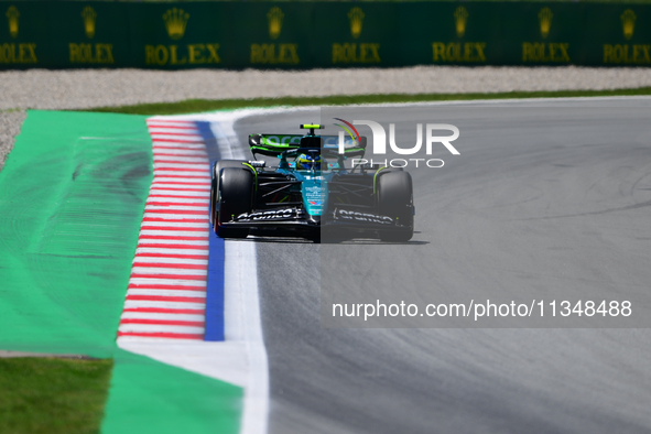 Fernando Alonso of Aston Martin Cognizant F1 Team is driving his single-seater during free practice of the Spanish GP, the 10th round of the...