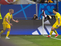 Mykola Shaparenko (R) of Ukraine is celebrating after scoring his team's first goal with Oleksandr Zinchenko (L) of Ukraine  during the UEFA...