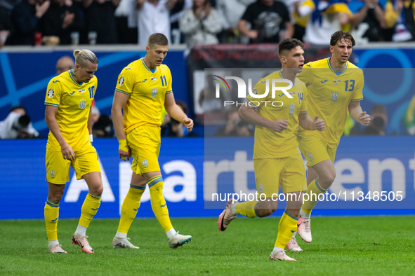 Mykhailo Mudryk, Artem Dovbyk, Georgiy Sudakov, and Ilya Zabarnyi (L-R) of Ukraine are celebrating after their team's first goal  during the...