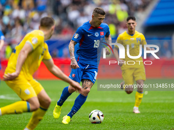 Juraj Kucka of Slovakia is controlling the ball  during the UEFA EURO 2024 group stage match between Slovakia and Ukraine at Dusseldorf Aren...