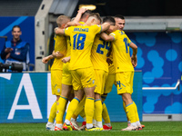 Roman Yaremchuk of Ukraine is celebrating after scoring his team's second goal with his teammates  during the UEFA EURO 2024 group stage mat...