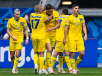 Roman Yaremchuk of Ukraine is celebrating after scoring his team's second goal with Oleksandr Zinchenko of Ukraine  during the UEFA EURO 202...