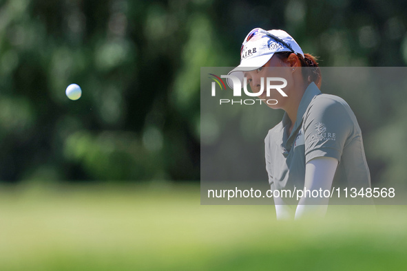 Jin Young Ko of Republic of Korea chips up to the 8th green during the first round of the KPMG Women's PGA Championship at Sahalee Country C...