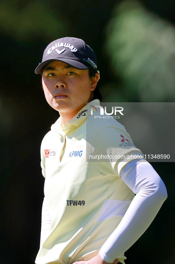 Yuka Saso of Japan waits on the 8th green during the first round of the KPMG Women's PGA Championship at Sahalee Country Club on Thursday, J...