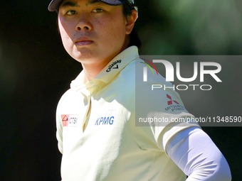 Yuka Saso of Japan waits on the 8th green during the first round of the KPMG Women's PGA Championship at Sahalee Country Club on Thursday, J...