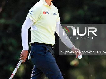 Yuka Saso of Japan walks on the 9th green during the first round of the KPMG Women's PGA Championship at Sahalee Country Club on Thursday, J...