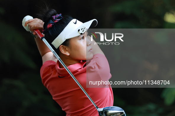 Lucy Li of Redwood Shores, California hits from the 16th tee during the first round of the KPMG Women's PGA Championship at Sahalee Country...