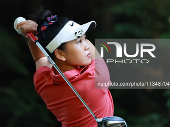 Lucy Li of Redwood Shores, California hits from the 16th tee during the first round of the KPMG Women's PGA Championship at Sahalee Country...