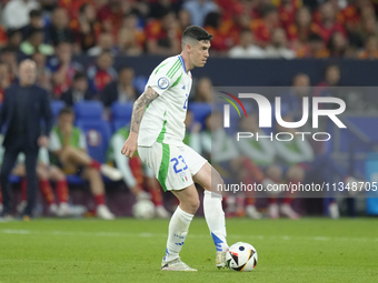 Alessandro Bastoni centre-back of Italy and Inter Milan does passed during the UEFA EURO 2024 group stage match between Spain and Italy at A...