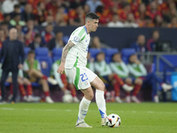 Alessandro Bastoni centre-back of Italy and Inter Milan does passed during the UEFA EURO 2024 group stage match between Spain and Italy at A...