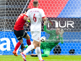 Marko Arnautovic, Wojciech Szczesny are playing during the UEFA Euro 2024 Group D match between Poland v Austria, at the Olympiastadion in B...