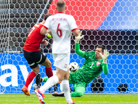 Marko Arnautovic, Wojciech Szczesny are playing during the UEFA Euro 2024 Group D match between Poland v Austria, at the Olympiastadion in B...