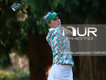 Lexi Thompson of the United States tees off on the 12th hole during Day Two of the KPMG Women's PGA Championship at Sahalee Country Club in...