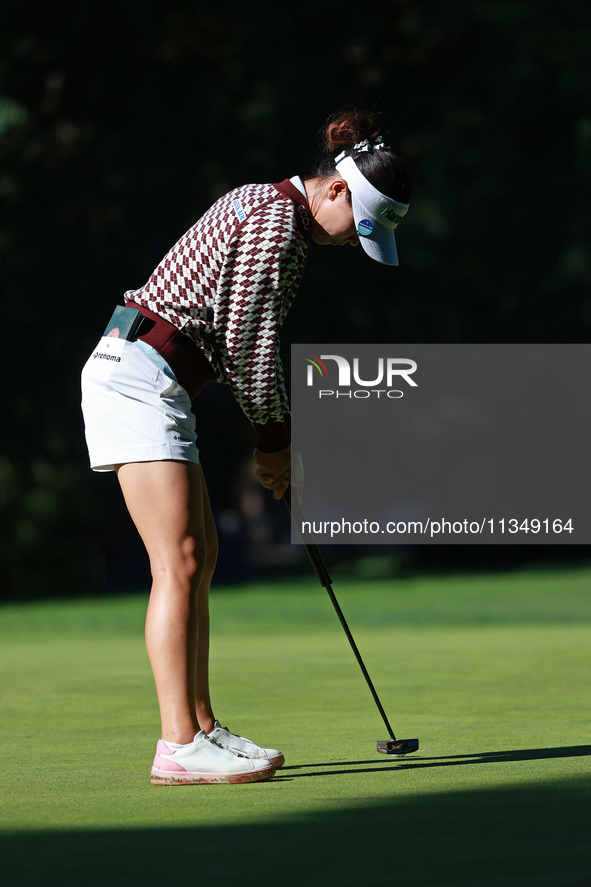 Lydia Ko of New Zealand plays her putt on the 11th green during Day Two of the KPMG Women's PGA Championship at Sahalee Country Club in Samm...