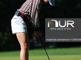 Lydia Ko of New Zealand plays her putt on the 11th green during Day Two of the KPMG Women's PGA Championship at Sahalee Country Club in Samm...