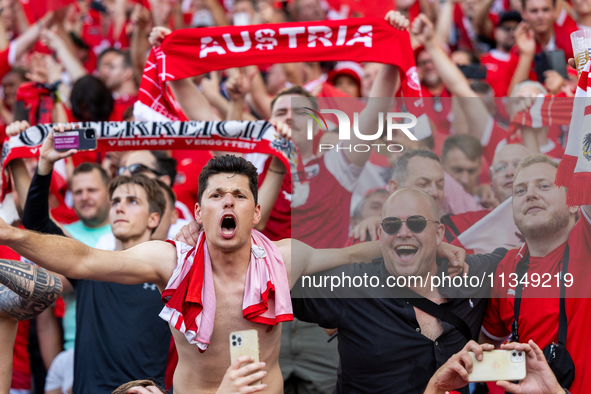 Austrian fans are celebrating victory   during the UEFA Euro 2024 Group D match between Poland v Austria, at the Olympiastadion in Berlin,Ge...