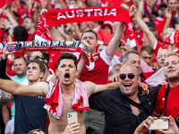 Austrian fans are celebrating victory   during the UEFA Euro 2024 Group D match between Poland v Austria, at the Olympiastadion in Berlin,Ge...