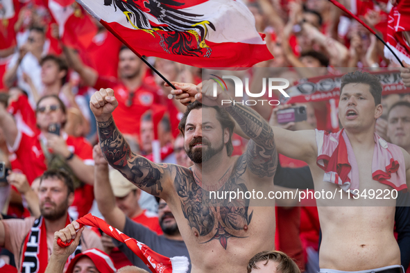 Austrian fans are celebrating victory   during the UEFA Euro 2024 Group D match between Poland v Austria, at the Olympiastadion in Berlin,Ge...