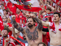 Austrian fans are celebrating victory   during the UEFA Euro 2024 Group D match between Poland v Austria, at the Olympiastadion in Berlin,Ge...