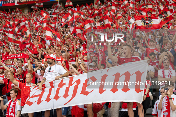 Austrian fans are celebrating victory   during the UEFA Euro 2024 Group D match between Poland v Austria, at the Olympiastadion in Berlin,Ge...