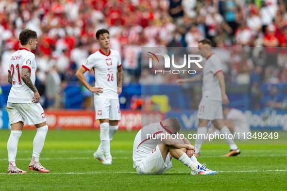 Nicola Zalewski, Kacper Urbanski, Karol Swiderski are playing during the UEFA Euro 2024 Group D match between Poland v Austria, at the Olymp...