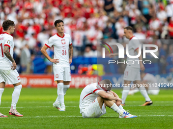 Nicola Zalewski, Kacper Urbanski, Karol Swiderski are playing during the UEFA Euro 2024 Group D match between Poland v Austria, at the Olymp...