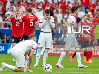 Konrad Laimer, Stefan Posch, Piotr Zielinski, Robert Lewandowski are playing during the UEFA Euro 2024 Group D match between Poland v Austri...