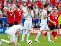 Konrad Laimer, Stefan Posch, Piotr Zielinski, Robert Lewandowski are playing during the UEFA Euro 2024 Group D match between Poland v Austri...