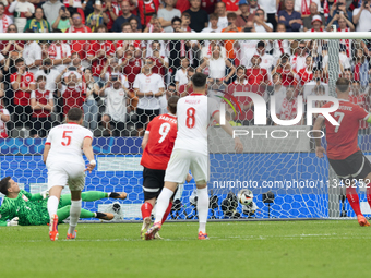 Wojciech Szczesny, Marko Arnautovic are playing during the UEFA Euro 2024 Group D match between Poland v Austria, at the Olympiastadion in B...