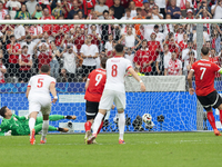 Wojciech Szczesny, Marko Arnautovic are playing during the UEFA Euro 2024 Group D match between Poland v Austria, at the Olympiastadion in B...