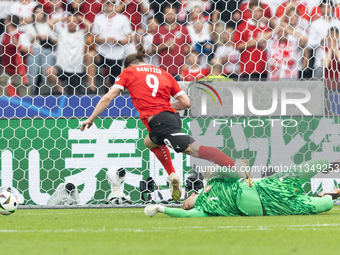 Wojciech Szczesny, Marcel Sabitzer are playing during the UEFA Euro 2024 Group D match between Poland v Austria, at the Olympiastadion in Be...