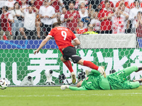 Wojciech Szczesny, Marcel Sabitzer are playing during the UEFA Euro 2024 Group D match between Poland v Austria, at the Olympiastadion in Be...