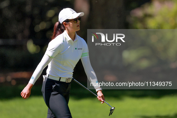 Yu Liu of China walks to the 15th green during the second round of the KPMG Women's PGA Championship at Sahalee Country Club on Friday, June...