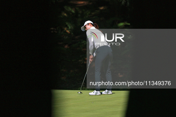 Yu Liu of China follows her putt on the 15th green during the second round of the KPMG Women's PGA Championship at Sahalee Country Club on F...