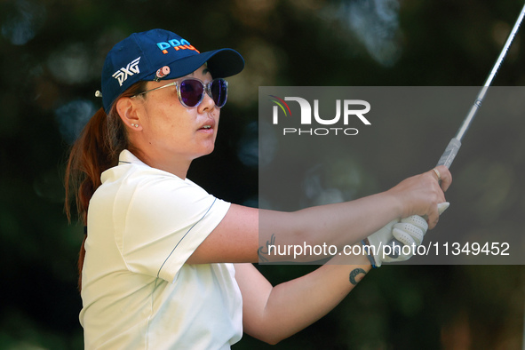 Mina Harigae of Monterey, California hits from the 16th tee during the second round of the KPMG Women's PGA Championship at Sahalee Country...