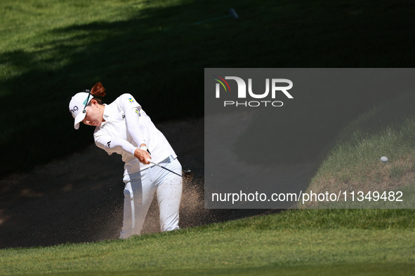 Hinako Shibuno of Japan hits out of the bunker toward the 7th green during Day Two of the KPMG Women's PGA Championship at Sahalee Country C...