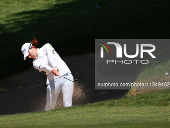 Hinako Shibuno of Japan hits out of the bunker toward the 7th green during Day Two of the KPMG Women's PGA Championship at Sahalee Country C...