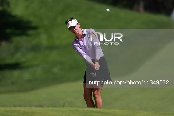 Sarah Schmelzel of the United States watches her shot toward the 18th green during Day Two of the KPMG Women's PGA Championship at Sahalee C...