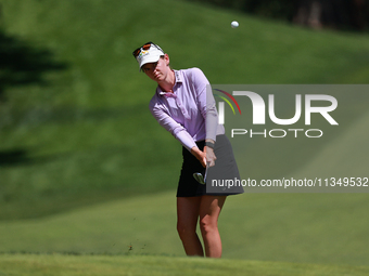 Sarah Schmelzel of the United States watches her shot toward the 18th green during Day Two of the KPMG Women's PGA Championship at Sahalee C...