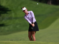 Sarah Schmelzel of the United States watches her shot toward the 18th green during Day Two of the KPMG Women's PGA Championship at Sahalee C...