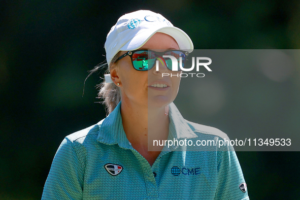 Sarah Kemp of Australia walks on the 18th fairway after hitting during the second round of the KPMG Women's PGA Championship at Sahalee Coun...