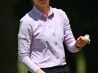 Sarah Schmelzel of the United States acknowledges the gallery after her birdie on the 18th green during Day Two of the KPMG Women's PGA Cham...